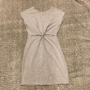 Grey cute stretch t-shirt dress with cut out in mid section.